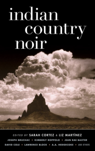Indian Country Noir featuring puffy white clouds above a tall cliff against a black background.