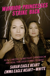 Warrior Princesses Strike Back by Sarah Eagle Heart and Emma Eagle Heart-White featuring a photograph of two women in black with lightning in the background.