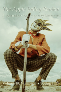 Cover of Apple Valley Review, featuring a masked jester squatting with a cane.