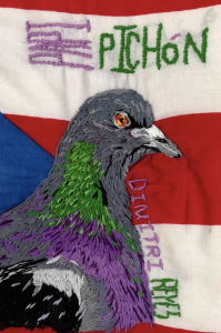 Papi Pichón by Dimitri Reyes featuring needlework art of a pigeon in front of an American flag.