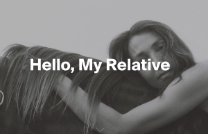 Hello, My Relative by Braudie Blais-Billie featuring a black and white photograph of a woman with long hair draped along a horse’s neck.