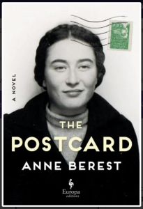 The Postcard by Anne Berest featuring a photograph of a woman in a black coat and braided hair with a stamp in the upper right corner.
