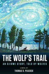 Cover of The Wolf's Trail: An Ojibwe Story, Told by Wolves by Thomas D. Peacock, featuring white text and an illustration of the silhouette of a wolf howling in a green forest beneath a sky made up of light blue, green, and white swirling circular patterns. 