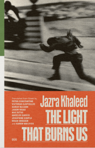 Cover of The Light That Burns by Jazra Khaleed, featuring a blurred black and white photograph of a person running on a sidewalk. 