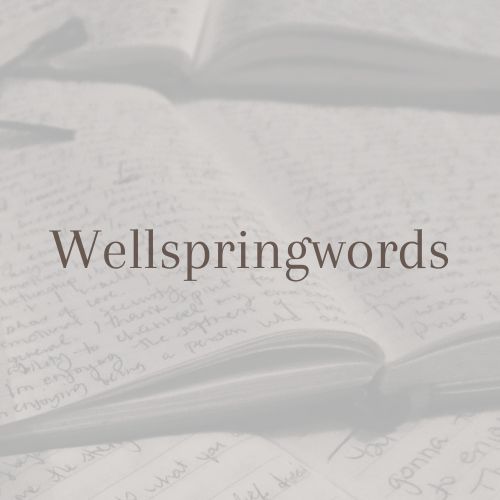 The Wellspringwords logo, featuring dark brown text on a background of an open journal filled with writing.
